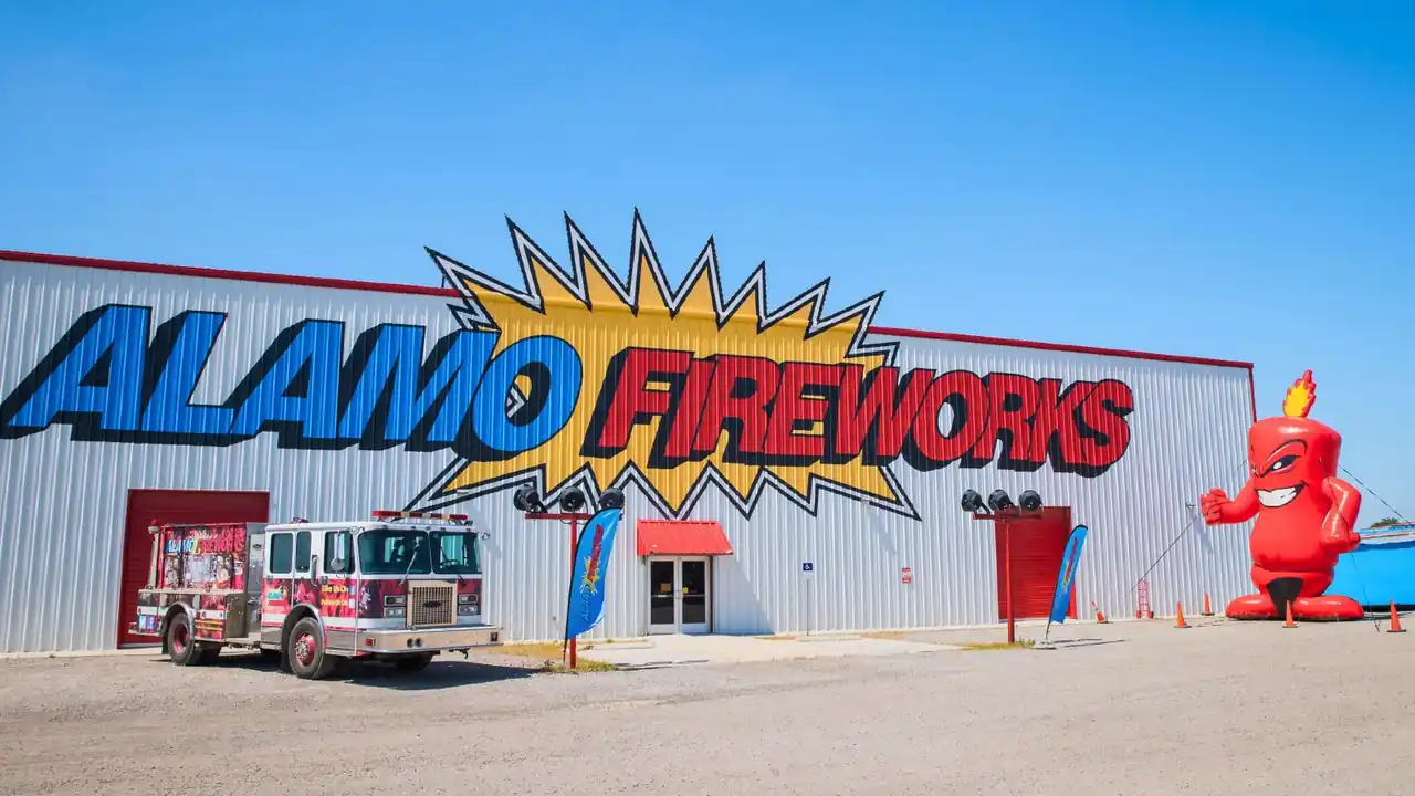 Alamo Fireworks megastore with a fire truck and the Burst mascot out front